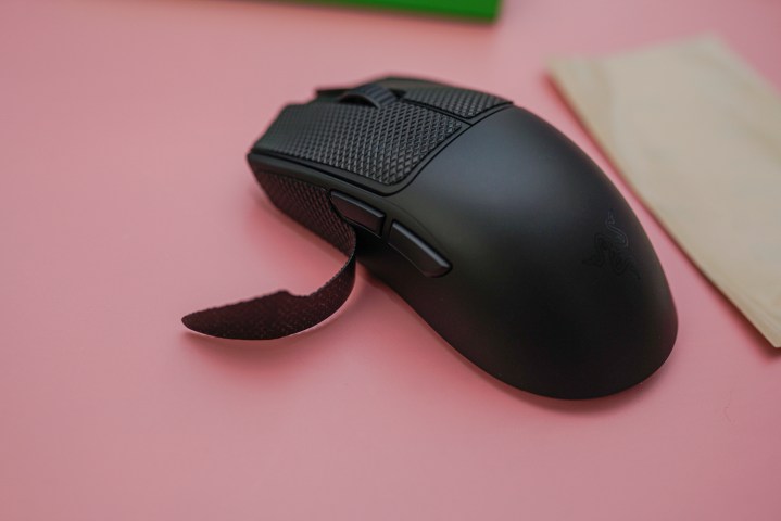 The Razer Viper V3 Pro with its grip tape partially removed.
