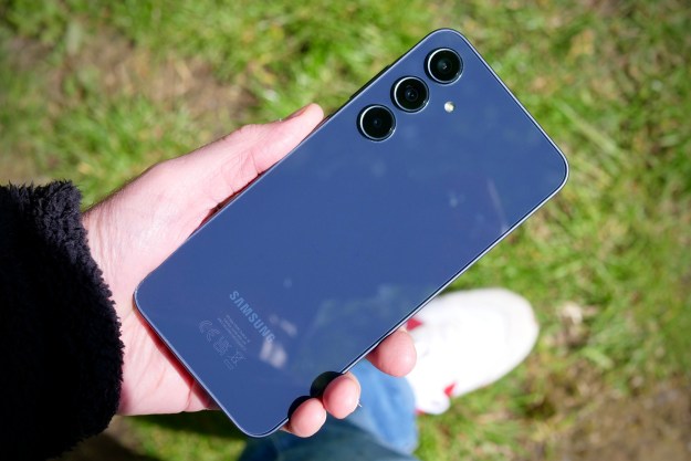 A person holding the Samsung Galaxy A35, showing the back of the phone.