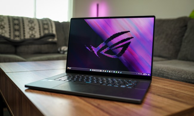The Asus ROG Zephyrus G16 sitting on a coffee table.