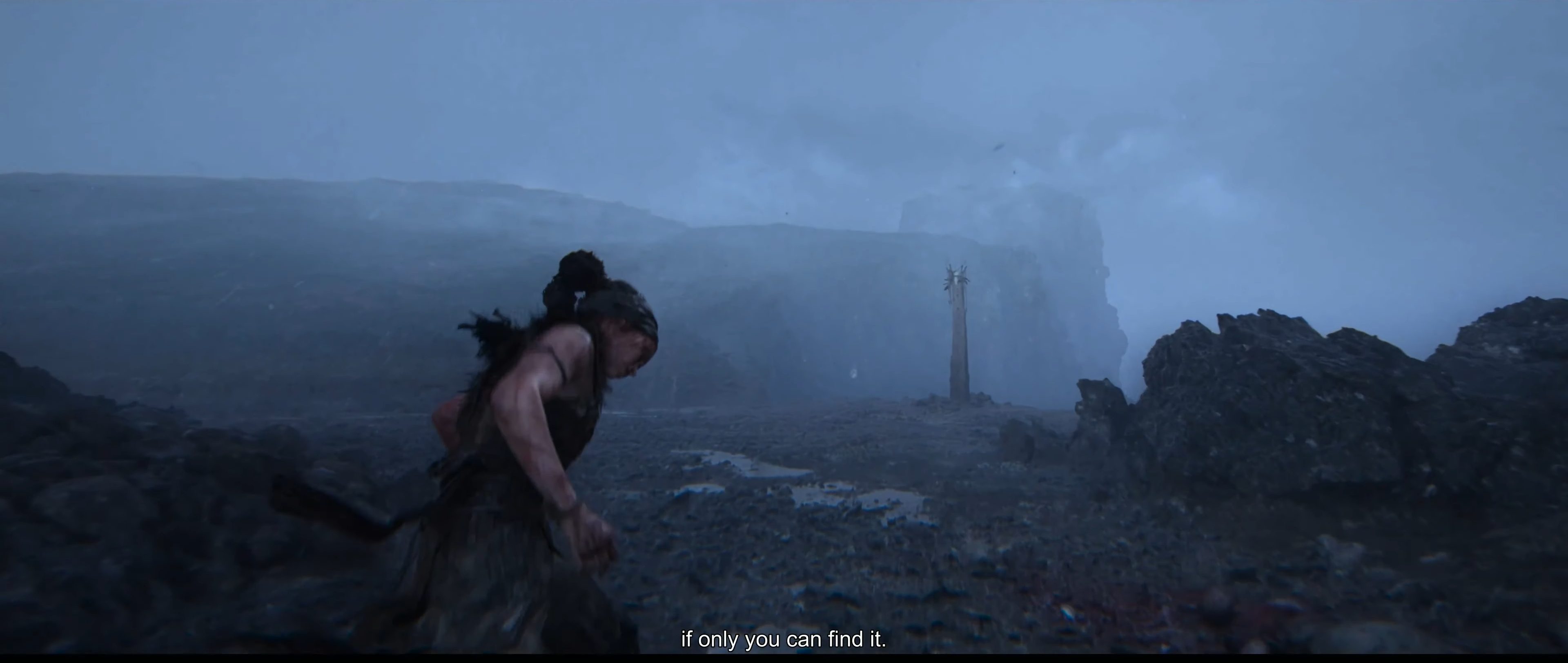 Senua approaching a lore totem in Hellblade 2.