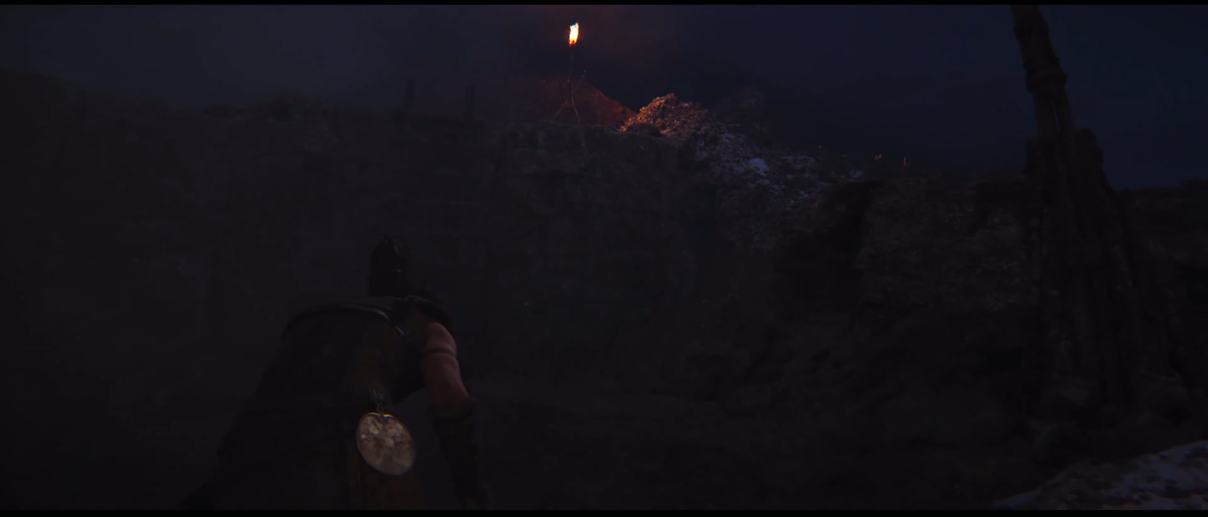 Senua approaching a lore totem in Hellblade 2.