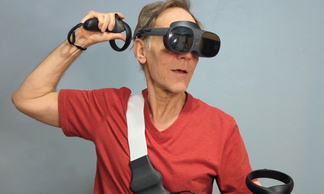 Alan Truly plays a game with the HTC Vive XR Elite.