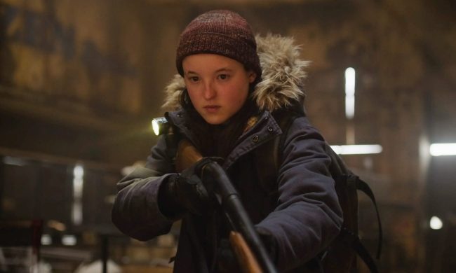 Bella Ramsey wields a shotgun in The Last of Us.