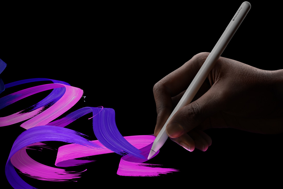 A photo of someone drawing with the Apple Pencil Pro.