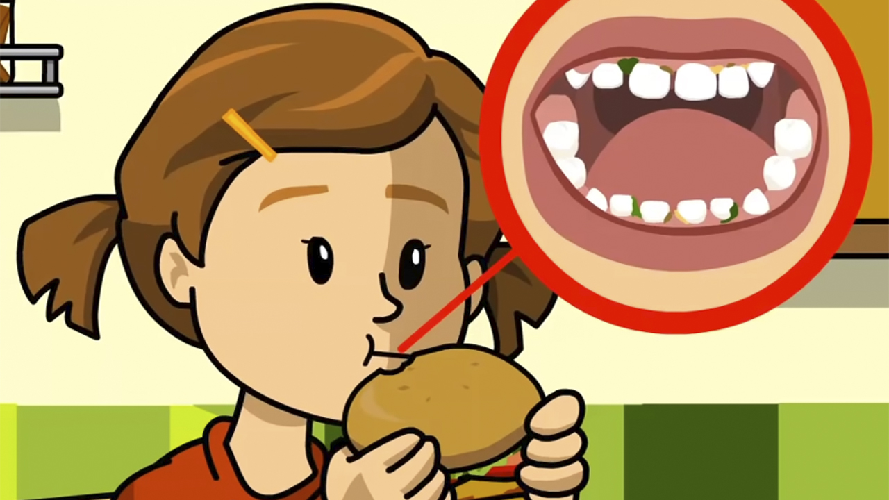 An animated image of a little girl with pigtails eating a hamburger, an inset image at the top, right showing bits of food on her teeth.