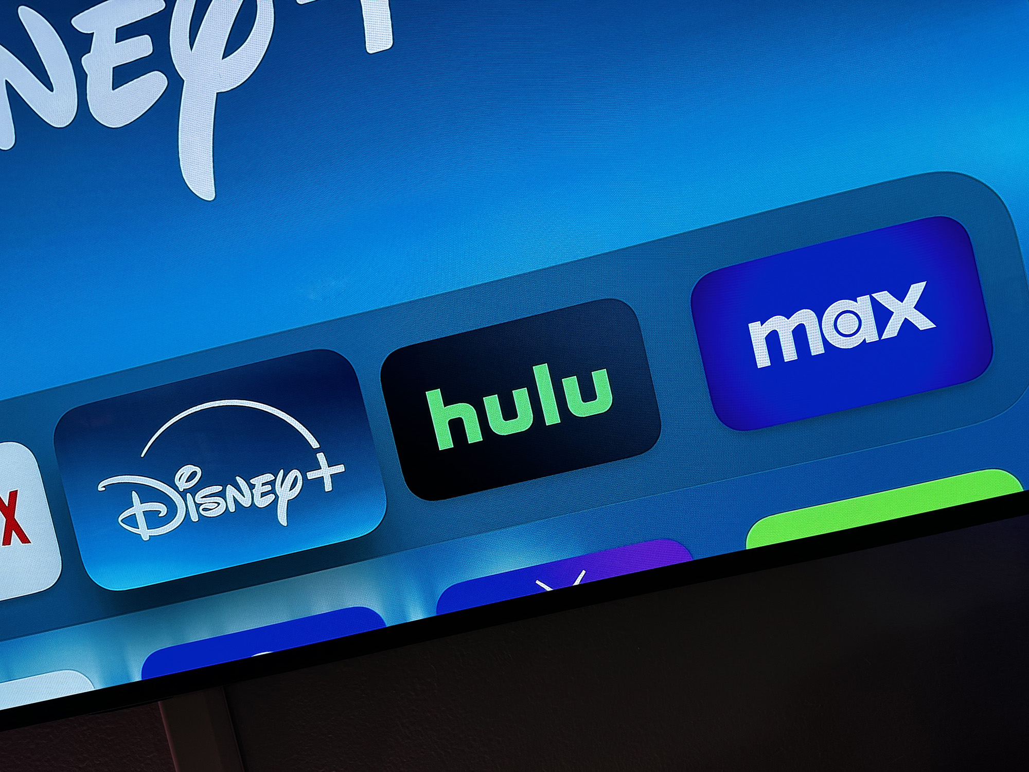 The Disney Plus, Hulu, and Max icons on Apple TV.