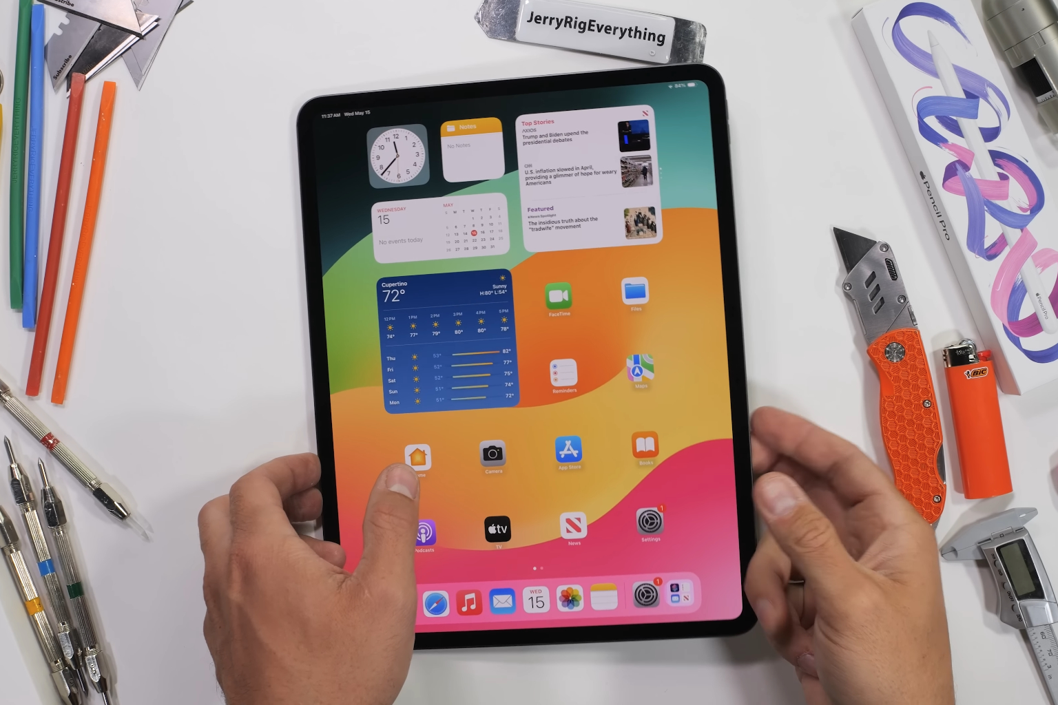 The iPad Pro (2024) during JerryRigEverything's bend test.