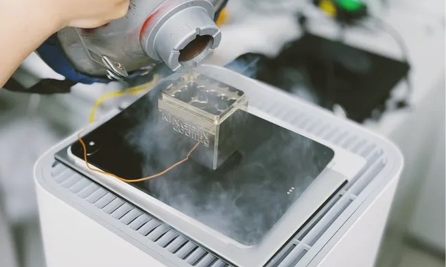 An iPad Pro being cooled with liquid nitrogen.