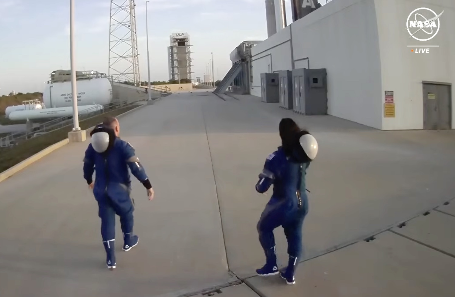 The Starliner astronauts arrive at the launchpad for the spacecraft's first crewed flight.