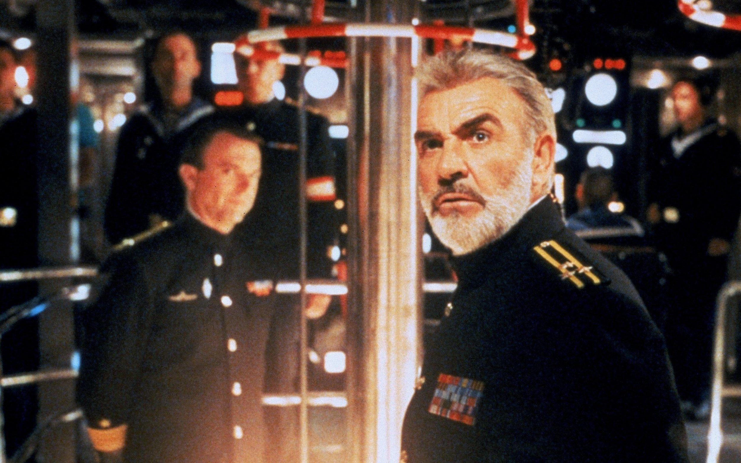 Two men stand in a submarine in The Hunt for Red October.