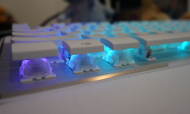 The underside of the Vulcan 2 TKL Pro's keys glow blue.